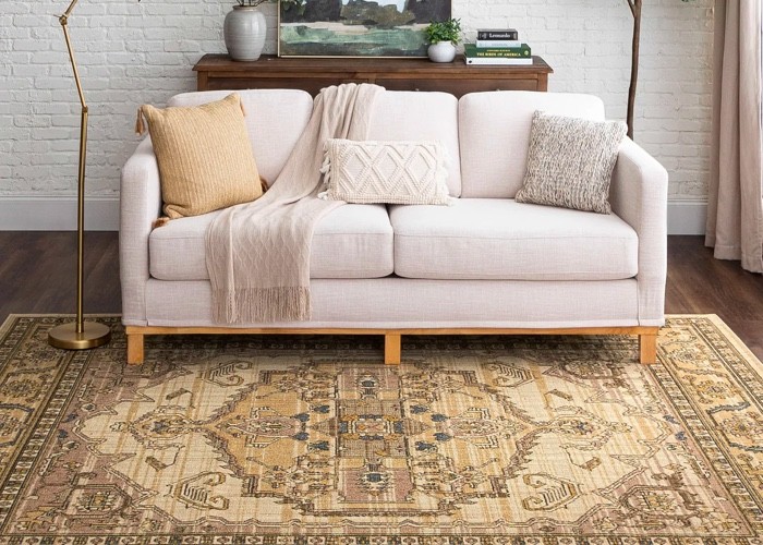 White couch on area rug | Demotte Carpet Inc.